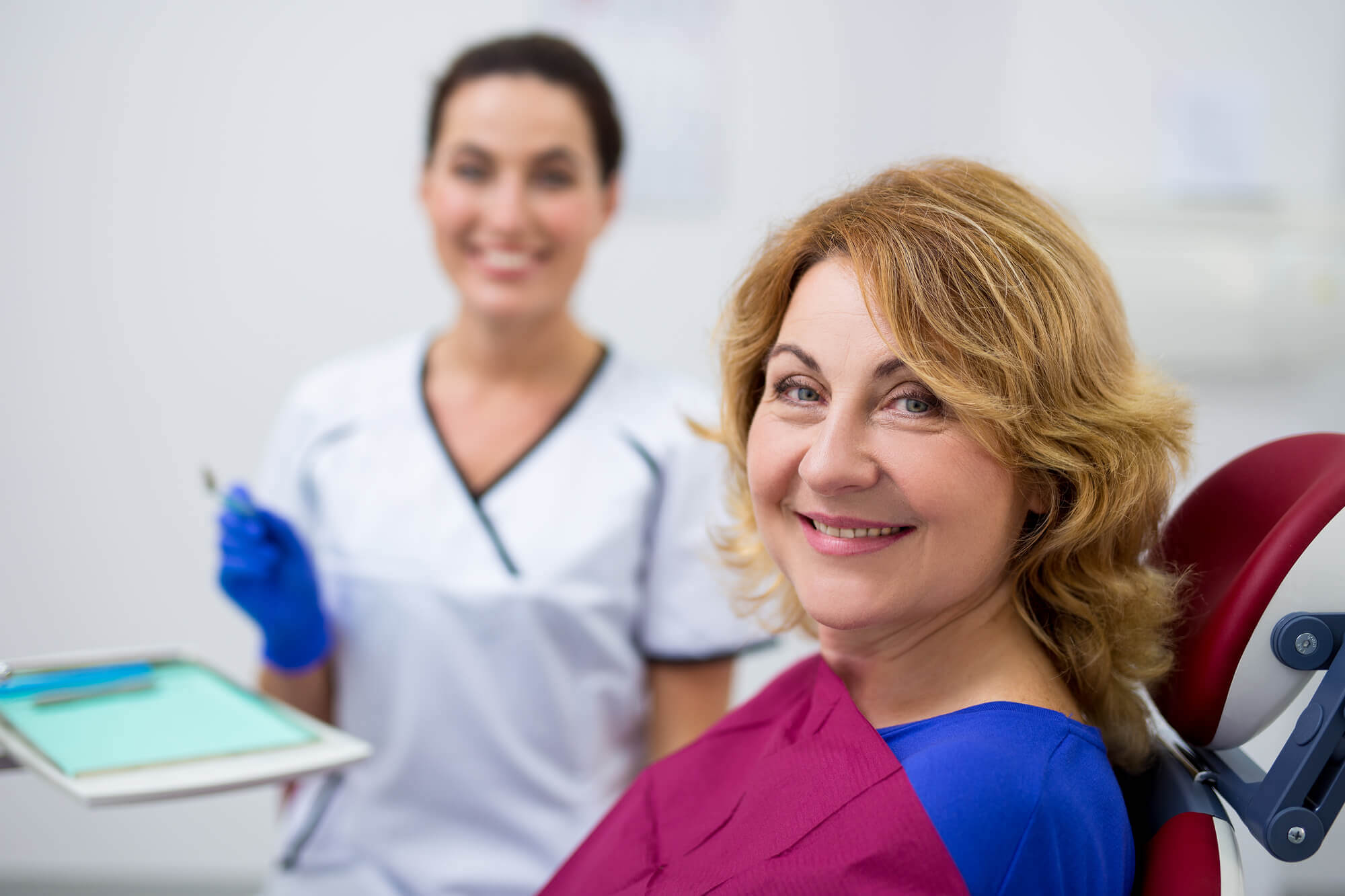 Portrait-Of-Cheerful-Mature-Woman-And-Dentist